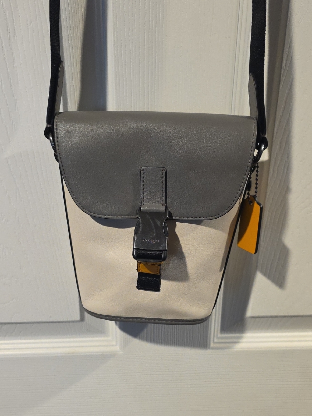 Coach Track Small Flap Crossbody, specifically in a colorblock leather design.